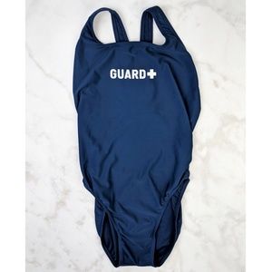 Dark Blue One Piece w/ Guard Graphic Lettering